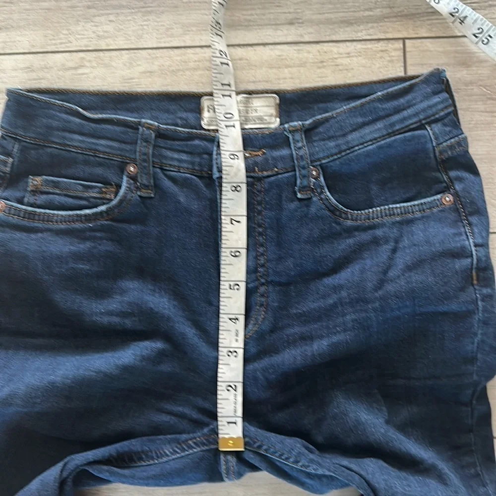 Free People size 27 busted knee skinny jeans